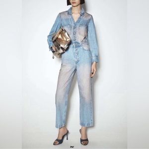 New distressed denim, long sleeve, jumpsuit button fly